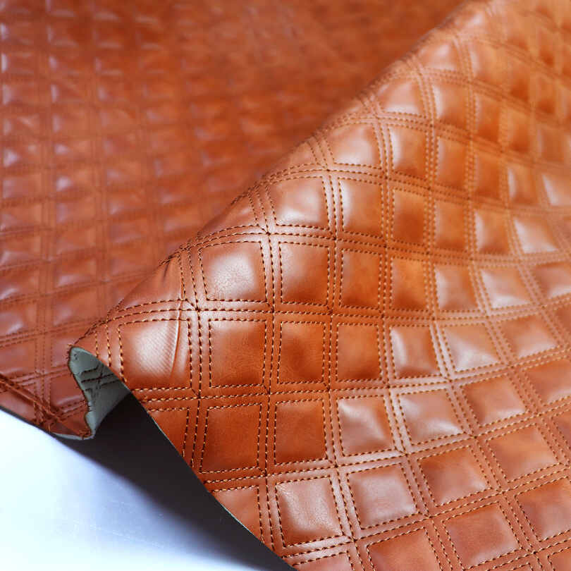 Tela de cuero automotriz acolchada artificial de costura del PVC de los coches de la espuma de la esponja